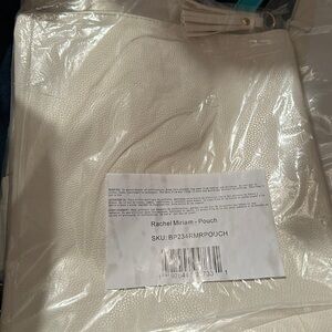 Rachel, Mariam white pouch